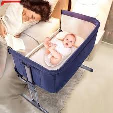the next best thing to holding baby in your arms the baby bay bedside sleeper is a crib that can be placed where baby most newborn bed portable bed baby cribs