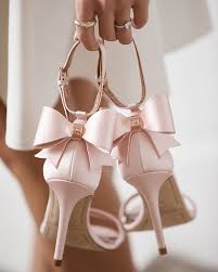 Add Feminine Flair To Your Evening Ensembles With Bowtifl Sandals