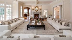 A beautifully arranged living room viewing the blue waters of seattle. Mansion Living Room Wild Country Fine Arts