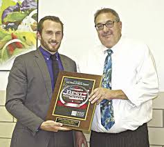 Stimac steps down at CL Johnson returns