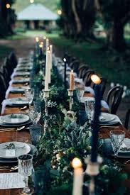 A floral centre piece and candles can make for a chic and classic tablescape. Hot Or Not 33 Halloween Wedding Ideas For Daring Couples