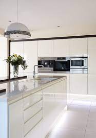 I'll definitely be back for more as soon as i move. Sleek Lines With This White Gloss Handleless Kitchen And Silestone Worktops White Modern Kitchen Sleek Kitchen Handleless Kitchen