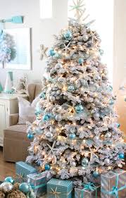First get a vase and put red lipstick in a circle on a jar full of frost and delight. White Flocked Coastal Christmas Tree Ideas With Blue Ornaments Shop The Look Coastal Decor Ideas Interior Design Diy Shopping