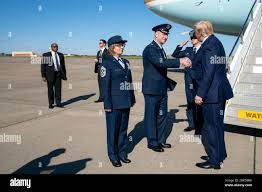President Donald J. Trump is greeted by U.S. Air Force personnel Col. Brian  Lehew and CMSgt. Judith McGrath after disembarks Air Force One Wednesday,  Oct. 21, 2019, at Pittsburgh International Airport in