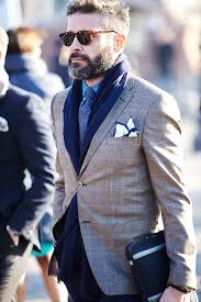 After you tie the knot, pull on both ends of the scarf to tighten it until you are satisfied with the look. How To Wear A Men S Scarf 5 Ways To Tie A Winter Scarf Lookastic