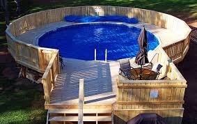Above Ground Swimming Pool Information For Pool Sizes Pool Liners And Installation Of Your Drea Above Ground Swimming Pools Above Ground Pool Decks Tank Pool