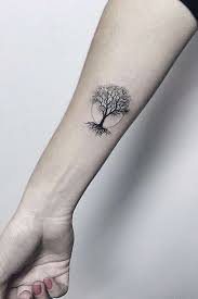 Some feature the tree of life, animals, a family crest, a heart, … Brilliant Wrist Tattoos For Girls All Designs Tattoos For Girls Tree Tattoo Men Tree Tattoo Small Roots Tattoo