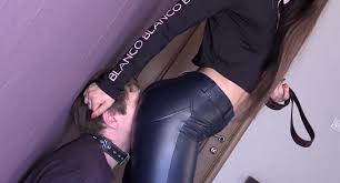 Femdom goddess makes him worship that ass in leather pants too
