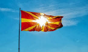 The national flag of macedonia consists of stylized yellow sun centered on red field with its eight broadening yellow rays extending out in all directions and end at the edges of the flag. The Macedonian Flag Everything You Need To Know Discovering Macedonia