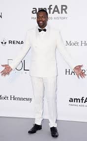 Black And White Suit With Bow Tie Pin On Amfar Galas Ny Cannes Milan La