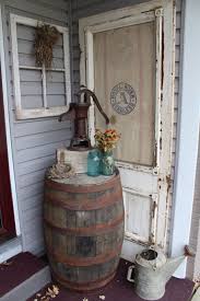 Primitive Outdoor Decorating Whiskey Barrel Old Door Feed Sack Window Fram Primitive Outdoor Decorating Front Porch Decorating Primitive Decorating Country