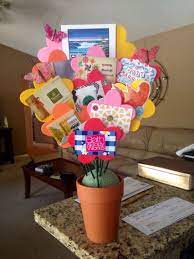 Once you've found the perfect gift for your graduate, purchase a chic graduation greeting card to go with it! S I Like This Ideas For Cards Make A Card Holder Just Get The Pot Then Put Foam At The Bottom Then Gift Card Bouquet Gift Card Basket Gift Card Presentation