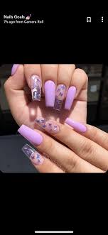Every other nail is a matching glittery purple hue, with half the nails in a subtle shimmering purple and the others in a festive darker shade. Crystal Purple Butterfly Nails Nails Butterfly Nail Short Nails