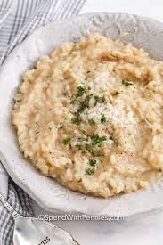 This Parmesan Risotto Recipe Is So Easy To Prepare Made With Arborio Rice Parmesan Cheese And Garlic It Is Creamy In 2020 Parmesan Risotto Easy Rice Recipes Risotto