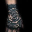 Realistic Black Rose Hand Tattoo