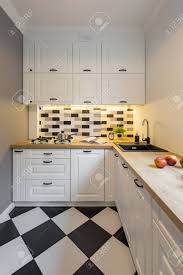 Check spelling or type a new query. Small Kitchen With Modern Black And White Floor Tiles Stock Photo Picture And Royalty Free Image Image 89766605