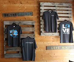 This is a great idea! 9 Merch Booth Ideas Shirt Display Merchandising Displays Craft Booth