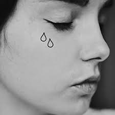 What does the teardrop tattoo mean? 10 Celebrity Tear Drop Tattoo Ideas And Meanings Body Tattoo Art