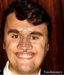 Charlie Kirk's head is way too big to fit