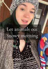 Lady Caught in Snow Storm with Two Goats and Rooster