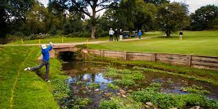 His drive leaks left, takes one bounce in a penalty area, and bounds back out. Penalty Areas England Golf