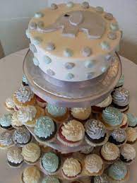 Baby Shower Cupcake Tower Elephant Theme For A Baby Boy Made By Ye Olde Pie Shoppe Baby Shower Cupcakes For Boy Baby Shower Cupcake Tower Baby Shower Cupcakes