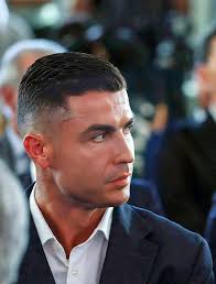 Respect Bruno Fernandez ❤️👏👏 Cristiano Ronaldo was addressing the press  in the mixed zone of the Allianz Arena. Suddenly, Bruno Fernandes showed up  with the Nations League trophy and put it on