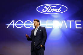 Ford CEO Jim Farley speaking at a corporate event about AI and workforce strategy.