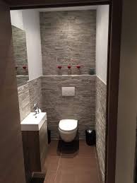 A plant gives a green, refreshing touch to contrast the clinical feel of white and gray tile. 40 Dreamy Wc Toilet Ideas In The Bathroom With Full Inspirations Bathroom Design Inspiration Small Bathroom Remodel Bathroom Layout