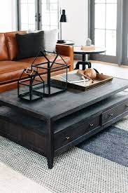 Warm Living Room With Brown And Black Interiors Leather Couches Living Room Living Room Design Brown Brown Living Room