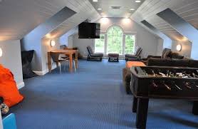 How To Transform Your Attic Into A Fun Game Room Attic Game Room Room Above Garage Home