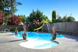 The best inflatable pools for whatever outdoor space you're workin' with. Rounded Swimming Pool With Slide Swimmingpool Smallpool Custompool Pool Landscaping Small Swimming Pools Backyard Pool Landscaping