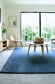 Rugs and carpets are interchangeable in many countries, primarily in asian countries. Design Tips For Using Area Rugs Over Carpet Rugs On Carpet Living Room Carpet Rug Over Carpet