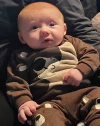 HELP! Could someone swap the crying baby face with the one looking at the  camera & not crying. I've tried a million times & can't do it.