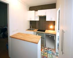 I would suggest framing in the backwall and putting in a sheet of beadboard. Washing Machine Hidden Under A Kitchen Counter Designs Ideas On Dornob