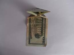 To make a small gift with a big. Christmas Origami Using Money Lovetoknow