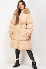 Enjoy climate conscious ✈ delivery & free returns now, with over 100.000 designer styles to discover online. Womens Long Puffer Coat With Drawstring Waist Camel Styledup Co Uk