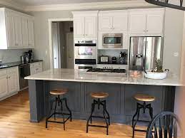 Whatever you have going on in your kitchen, and no matter how overpowering the design, white walls will feel beautiful and look bright and light. Kitchen Remodel Grey Kitchen Walls White Cabinets Kitchen Cabinets And Countertops Grey Kitchen Walls