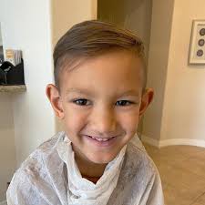 When in #quarentine haircut at home is the only other option. Yes that is a  trash bag around him 🙈 swipe left to see the end result. Any other mamas  out there