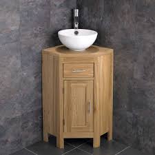 The bathroom is associated with the weekday morning rush, but it doesn't have to be. Medium 570mm Oak Corner Vanity Round White Ceramic Basin Alta