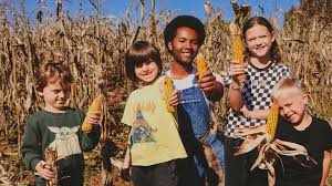 Families hand-pick corn for a good cause at New Jersey living history farm 