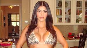 Do you ever get into those arguments with someone where they think your kid looks like one person and you think they've got it totally wrong? Kim Kardashian Blames The Baby For Posting Old Bikini Pic Racked