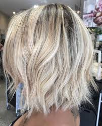 Many women opt for short hairstyles during the summer to beat the heat, to make a statement, or because short hair can be much easier to handle and style. White Blonde Bob Shag Thin Hair Haircuts White Blonde Bob Hairstyles For Thin Hair