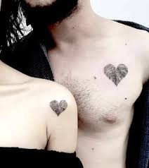 Hearts on the arm couples tattoos. 89 Matching Couple Tattoos With Meaning 2021