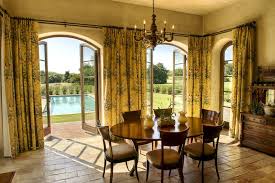 New curtains for the entry | jones design company. Other Bright Yellow Curtains Drapes Mediterranean Dining Room With Round Wood Dining Table And French Door Curtain Ideas