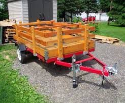 This is the inexpensive folding 4'x8' haulmaster 1200 lb flatbed trailer (deck not included) that goes for about $300 at harbor freight. Woodworking On A Half Shoestring 45 Harbor Freight Folding Utility Trailer Build Utility Trailer Folding Utility Trailer Trailer Build