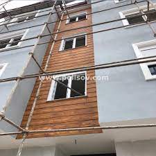 Ahşap kaplama, binalara doğal bir görüntü vermektedir. Antalya Ahsap Gorunumlu Poliuretan Dis Cephe Kaplama Ve Susleme Tavan Gobegi Mimari Antalya