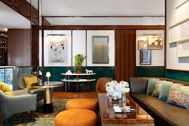 Ottomans have evolved to do more than just support your heels. Cafe Boulud Redesign Four Seasons Toronto Architectural Digest