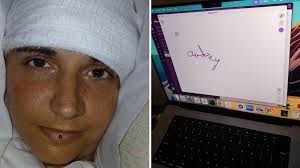 Woman writes her name for the first time in 20 years using only her thoughts