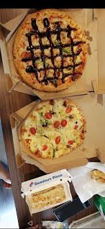 I don't know why but they choose to cut it in a grid rather than the typical relatively uniform pizza slices. Domino S Pizza George Town Restaurant Reviews Phone Number Photos Tripadvisor